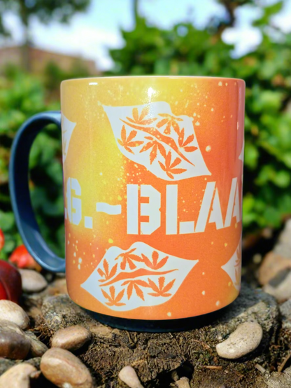 Mug with 'G-BLAA' text and leaf designs on a gradient background